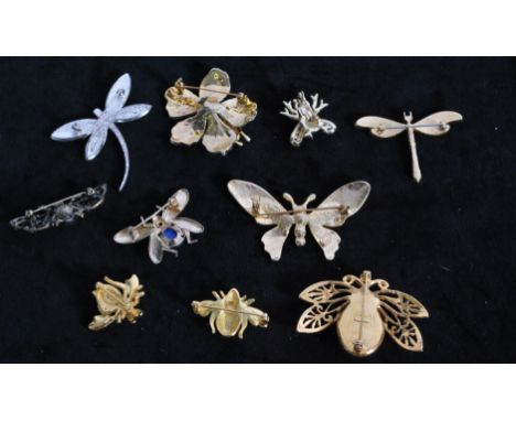 A collection of 10 vintage bug brooches to include signed Joan Rivers, Avon, MFA, AB Rhinestone, Enamel, faux pearl, confetti