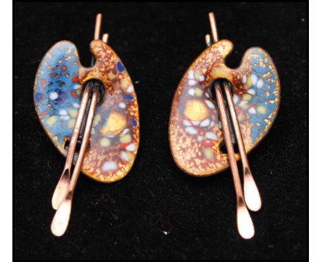 A pair of signed vintage earrings in the form or artists pallets in copper coloured metal with enamel decoration. Signed Mati