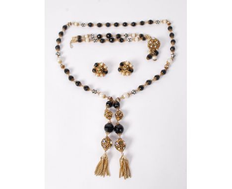 A signed vintage Hob&eacute; demi parure consisting of necklace bracelet and earrings strung with pearls&nbsp; and crystal gl