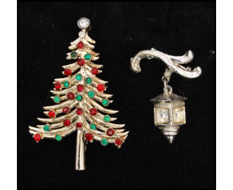 A 1950s vintage signed Christmas tree brooch, signed Dodds together with a rhinestone lantern brooch. x2&nbsp; Largest measur