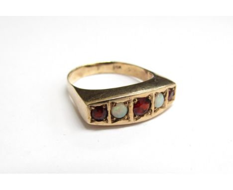 A gold garnet and opal five stone ring, marks rubbed (re-sized). Size Q, 3.6g 