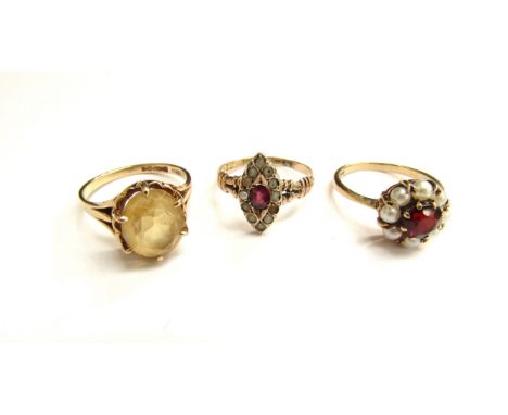Three 9ct gold rings, including garnet and seed pearl, citrine etc, sizes N and O, 8.1g 