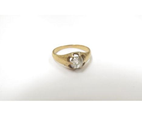 A diamond solitaire ring in open claw mount, marks rubbed. Size M, 0.70ct approx irregular shaped diamond, 3.1g 