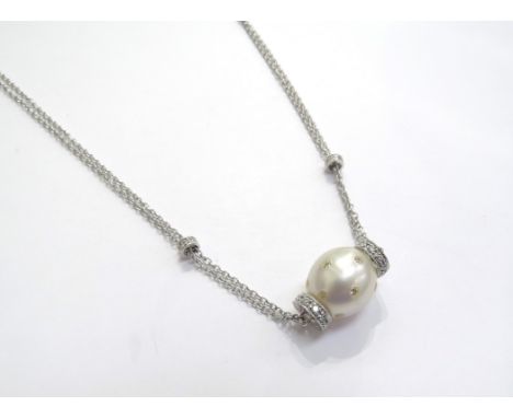 A white gold double trace chain link necklace with cultured pearl studded with diamonds and diamond set bands, stamped 18k, 4