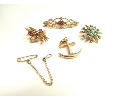 Three 9ct gold brooches two set with rubies and one seed pearl and turquoise (one missing) and a 9ct gold Anchor pendant, 13.