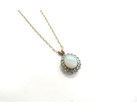 A 9ct gold opal and diamond cluster pendant hung on a 9ct gold chain, 46cm long, 4.4g total 