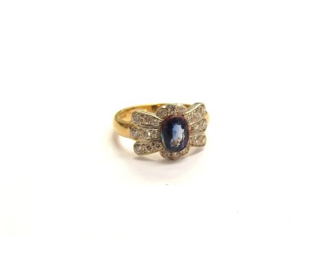 An 18ct gold sapphire and diamond Art Deco style ring. Size J/K, 4.5g 