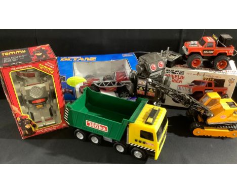 Toys - a Tommy atomic robot, by New Bright, boxed; a Nikko Octane radio controlled car, boxed; a Taiyo Auto Wheelie Ford Rang