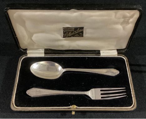 A George V silver Christening set, comprising spoon and fork, Suckling Ltd, Birmingham 1923/24, cased 