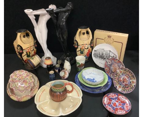 A ceramic Art Deco style figural lamp base, white glaze; another black; a pair of Cyples Old Pottery Embosa Ware vases;  Doul