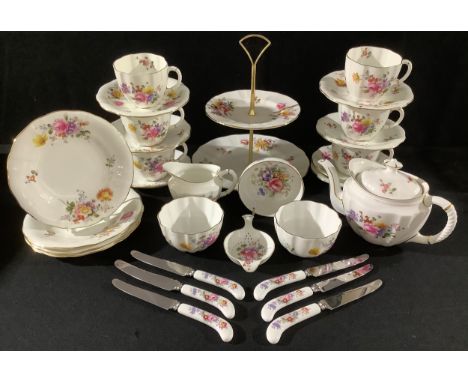 A Royal Crown Derby Posies pattern part tea service comprising bachelor teapot, sugar bowls, cream jug, side plates, two tier