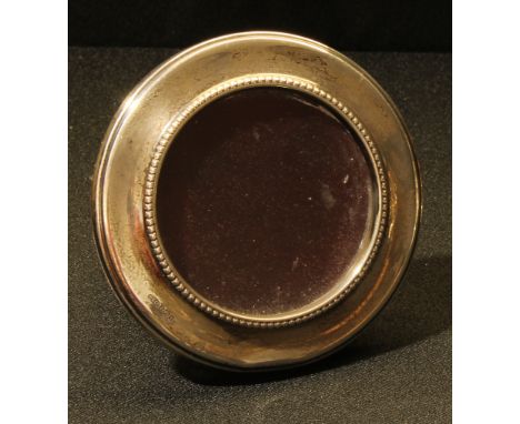 An Elizabeth II silver circular easel photograph frame, Birmingham 1984 
