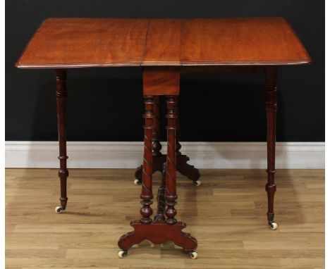 A Victorian mahogany Sutherland table, rounded rectangular top with fall leaves, spirally incised legs, supports and stretche