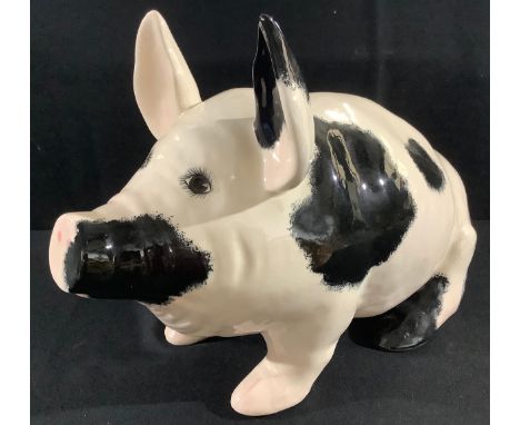 A Griselda Hill Wemyss ware pottery pig, seated, black markings, 31cm high, painted marks 