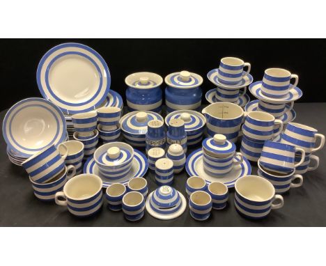 T G Green Cornish Ware table ware including storage jars, plates, jug, cups and saucers, etc 