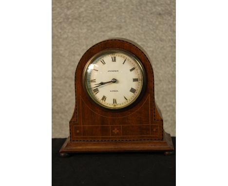 An Edwardian J.W. Benson inlaid walnut cased drum head mantle clock, the white painted dial with black Roman numerals raised 