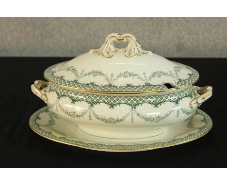 A late 19th century Royal Worcester porcelain lidded tureen and and platter, bearing marks to base. L.30 W.20cm. 
