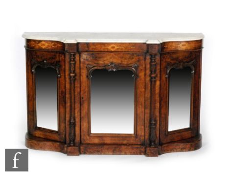 A Victorian inlaid walnut credenza with mirror panelled doors, floral inlaid frieze on a plinth, below a stepped marble top, 