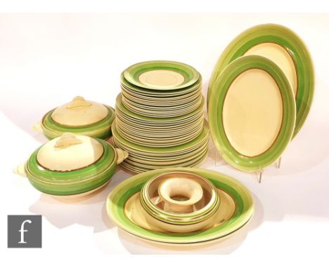 A 1940s Clarice Cliff Wilkinson pottery part dinner service comprising thirteen side plates, fourteen dinner plates, four mea
