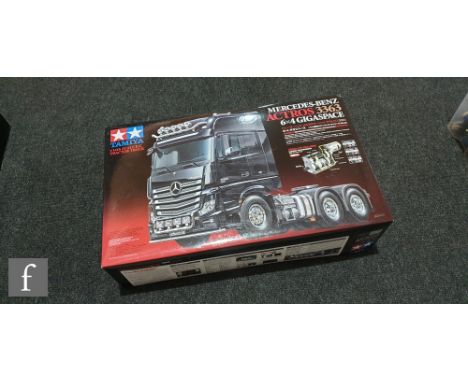 A Tamiya 56348 1:14 scale Mercedes-Benz Actros 3363 6x4 Gigaspace remote control tractor truck model kit, boxed. 