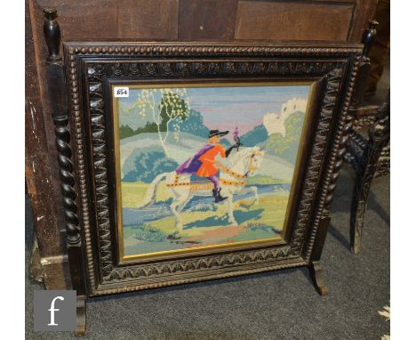 A Victorian carved oak firescreen with woolwork panel of a falconer on a white horse, height 92cm x width 80cm. 