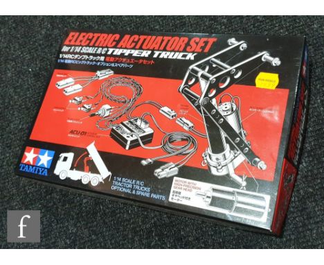 A Tamiya 56545 1:14 scale Electric Actuator Set for radio control Tipper Truck, boxed. 