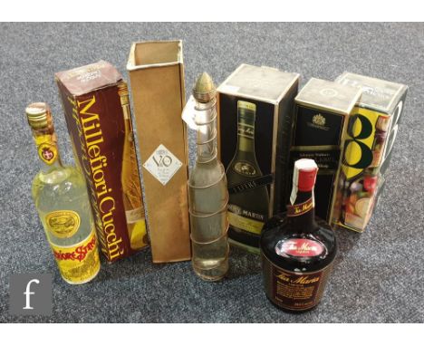 A one litre bottle of Remy Martin Cognac, a bottle of Johnnie Walker black label whisky, a bottle of Millefiori Cucchi, a bot