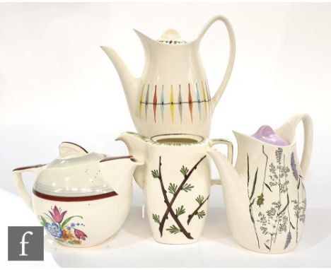 A small collection of assorted Midwinter tablewares to include a Whispering Grass coffee pot, a Cherokee coffee pot, three Mo