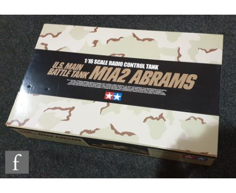 A Tamiya 56041 1:16 scale M1A2 Abrams US Main Battle Tank remote control model kit, boxed. 