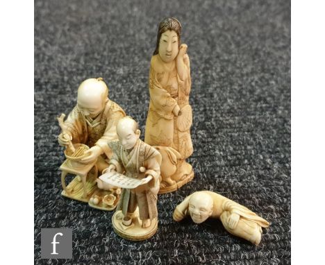 A 19th Century carved ivory seated figure of a man mixing tea with a stick, another of a scribe, a netsuke of a lying man and