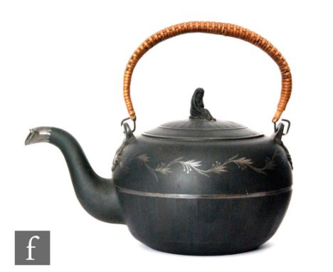 A 19th Century black basalt tea kettle, probably Wedgwood, decorated with a hand painted silver lustre garland of flowers wit