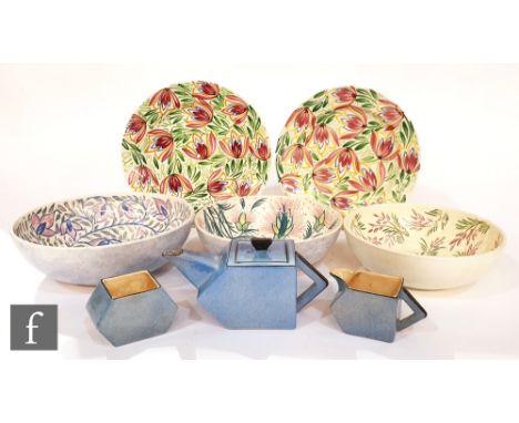 Three W.R. Midwinter 'Handcraft' bowls each decorated to the interior with crayon glaze floral patterns, printed marks, large