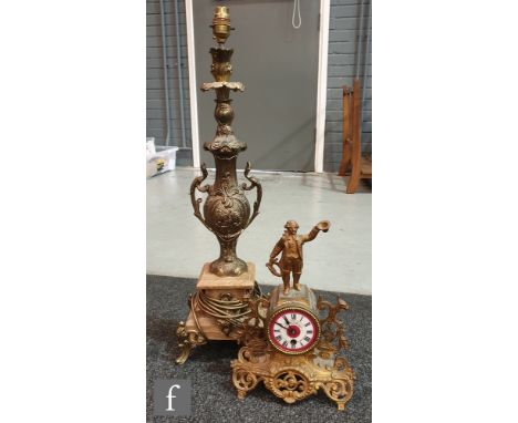 A late 19th Century French gilt metal mantle clock with enamelled dial, surmounted with a gent raising his hat and a gilt met