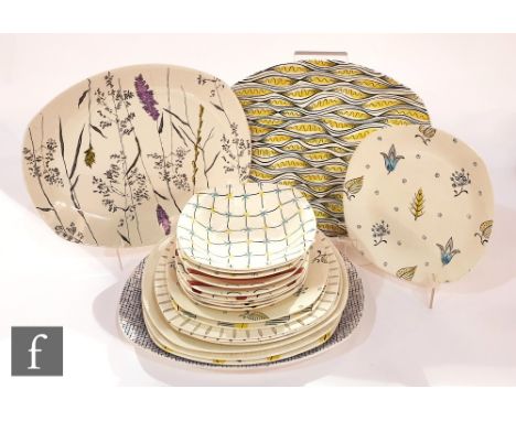 A collection of assorted Midwinter Stylecraft plates and bowls, patterns to include Carribean, Whispering Grass, Tropicana, B