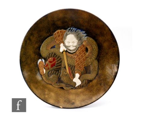 A large late 19th Century Royal Worcester Japonisme charger decorated with a Samurai warrior ensnaring a snake, all in matte 