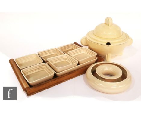 A small parcel quantity of later Clarice Cliff wares to include an undecorated Stamford tureen and cover, two posy rings and 