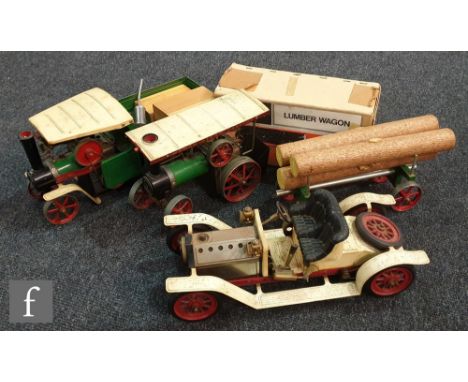 Four Mamod live steam vehicles, an SA1 Steam Roadster, a TE1a Traction Engine, an SW1 Steam Wagon and an LW1 Lumber Wagon (wi