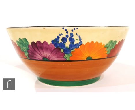 A Clarice Cliff Bizarre Gayday pattern footed bowl decorated with a band of flowers above a brown and green bands, printed Wi