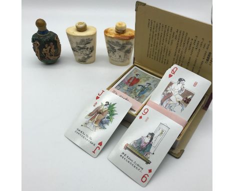 A Lot of two carved bone perfume/ snuff bottles engraved with erotic oriental scenes, Modern resin bottle set with nude lady 