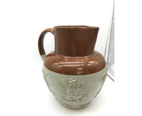 A Large stoneware pitcher jug depicting various character moulds includes George and the dragon, Possibly Royal Doulton Lambe
