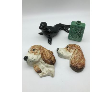 A mixed lot to include two dog wall plaques, seal decanter &amp; Beswick trout decanter 