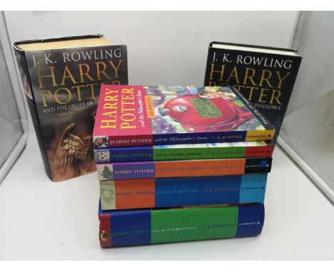 A collection of 7 Harry Potter books by J.K Rowling, to include first editions