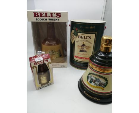 A lot of three full, sealed and boxed whisky's; Bell's Old Scotch Whisky 'Christmas 1990' (75cl) &amp; two Bell's blended sco