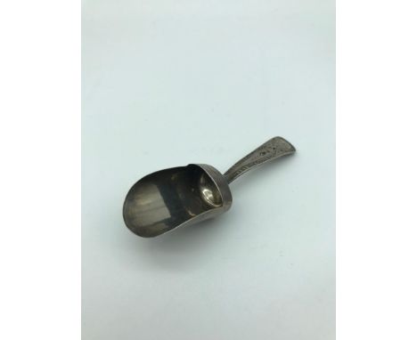 A Georgian silver caddy spoon. Made by Josiah Snatt dated 1802. Measures 9.3cm in length 
