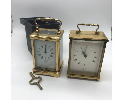 An antique Wilson &amp; Sharp Edinburgh white enamel faced,  brass carriage clock with key and travel box (French movement). 