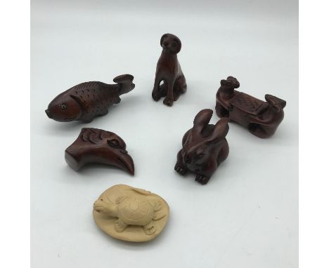 A lot of six oriental hand carved netsuke figurines 