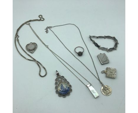 A Lot of silver jewellery which includes a Birmingham silver ring set with a single diamond and emerald, Maker P&amp;R Bushel