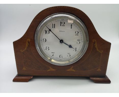 An Edwardian inlaid mantle clock, in a working condition 