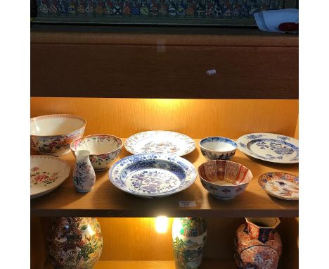 A shelf of Chinese &amp; Japanese bowls &amp; plates