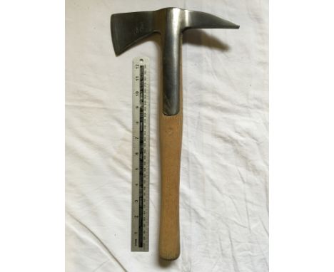 A strapped head fireman's axe.